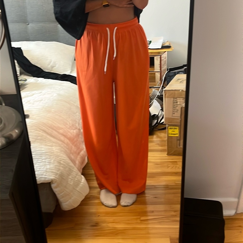 orange pants from amazon, size small but oversized